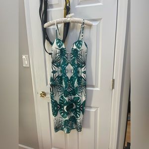 NEW without tags. Small. Tags were stuck to packaging so had to rip off.